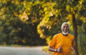 Man running in park; other reasons to get a body scan include peace of mind
